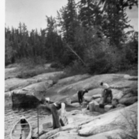 A-047: Berens River by canoe, unloading at portage