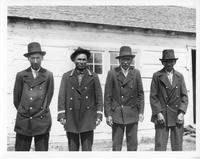 F-210: Four men standing, portrait 