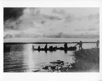 F-235: Canoes at shoreline 