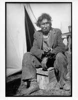 F-282: Ojibwa man with cigarette, portrait 