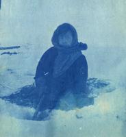 Ojibwe boy ice-fishing