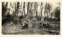 Stretcher bearers in the woods