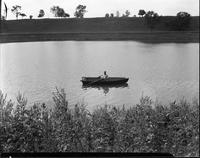 588: Simeon Gibson arrives by boat for work