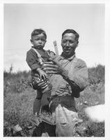 D065: Nipissing, Joseph Chevrier (Kiyaashkwaawan) holding Harvey Chevrier (Kiyaashkwaawanoosan)