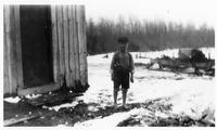 D097: Boy standing in snow, Roberval