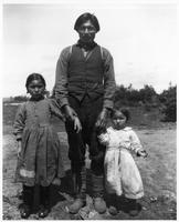 D108: Innu man and two girls, Sheshatshiu, circa 1920s