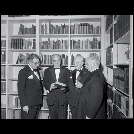 2. President Henry Allen Moe showed the Franklin Room to foreign delegates who attended the opening ceremonies of Library Hall. From left to right: Frank C. Francis, Principal Librarian and Director of the British Museum; Henry Allen Moe, president of the American Philosophical Society; Julien Cain, general administrator of France’s National Library; and the Right Rev. Abbott Anselm M. Albareda, O.S.B., Prefect of the Vatican Library.