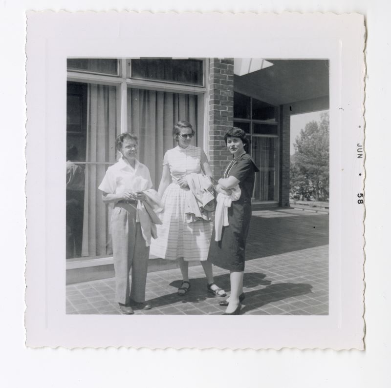 Barbara McClintock with two unidentified women standing outside.