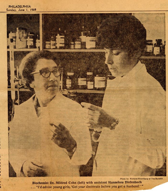 Photograph of Mildred Cohn with Hannelore Diefenbach in an article on women scientists.